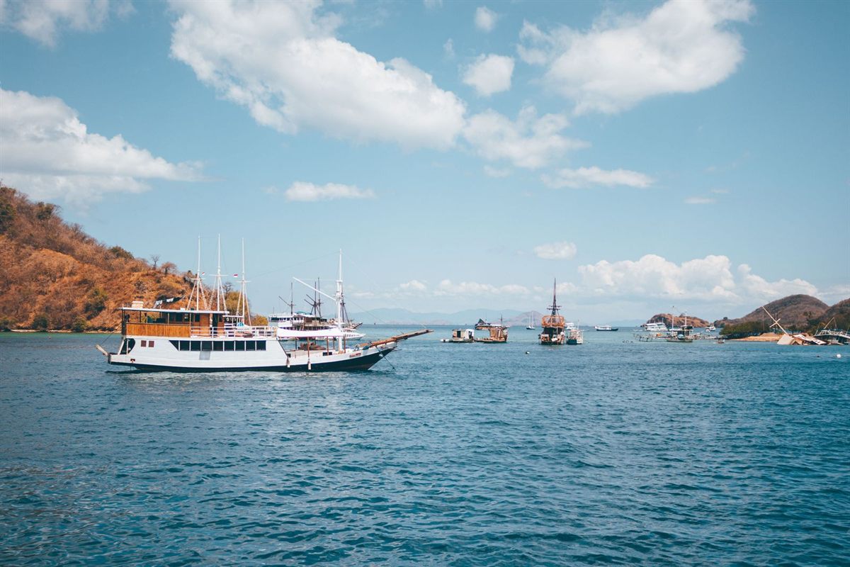 Small traditional cruise boats at anchor in Komodo
